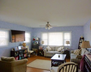 Sunny living room with all new walls, ceilings and floors!